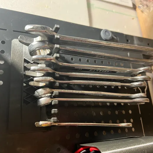 Peg board wrench holder