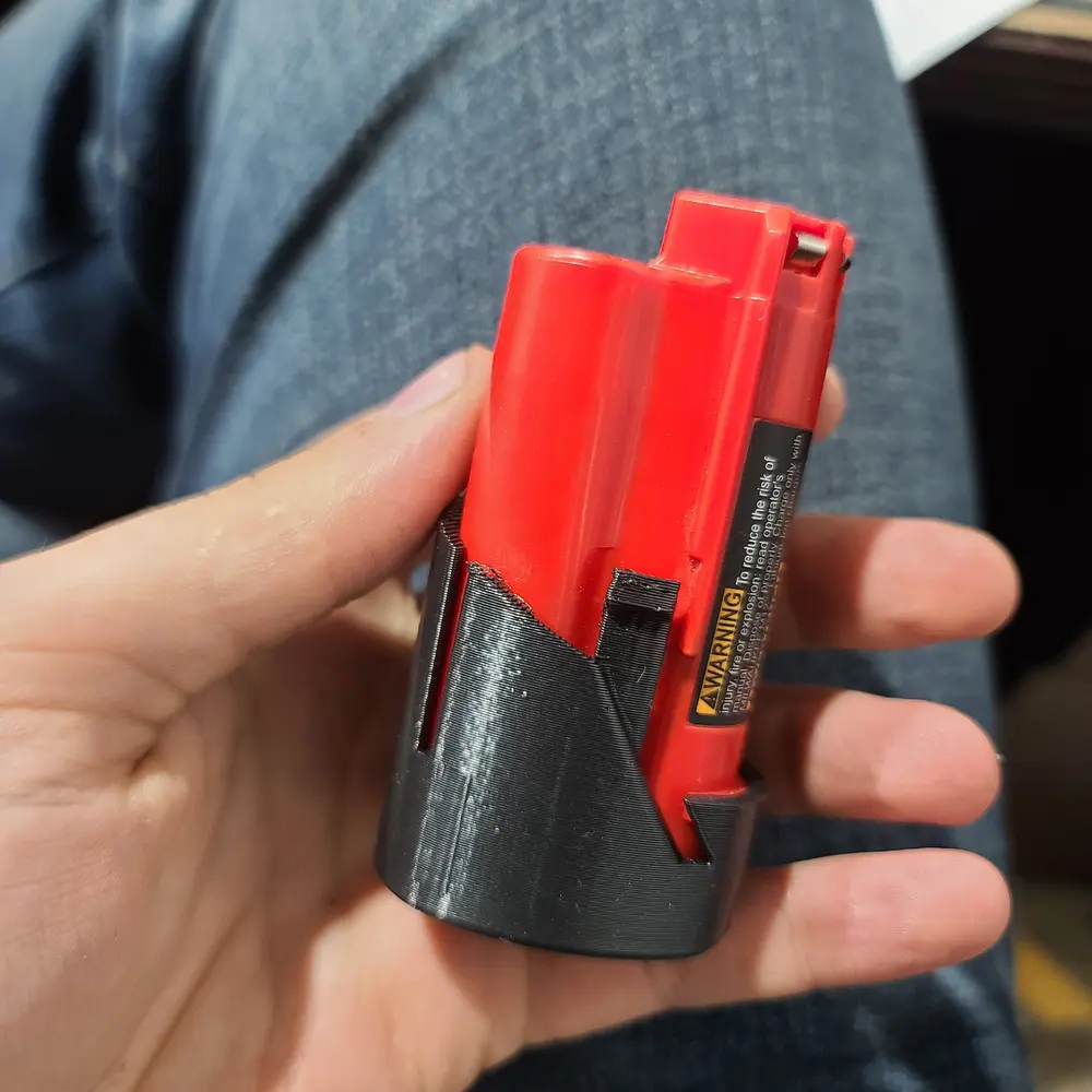 Milwaukee M12 Battery cover replacement - photo 2