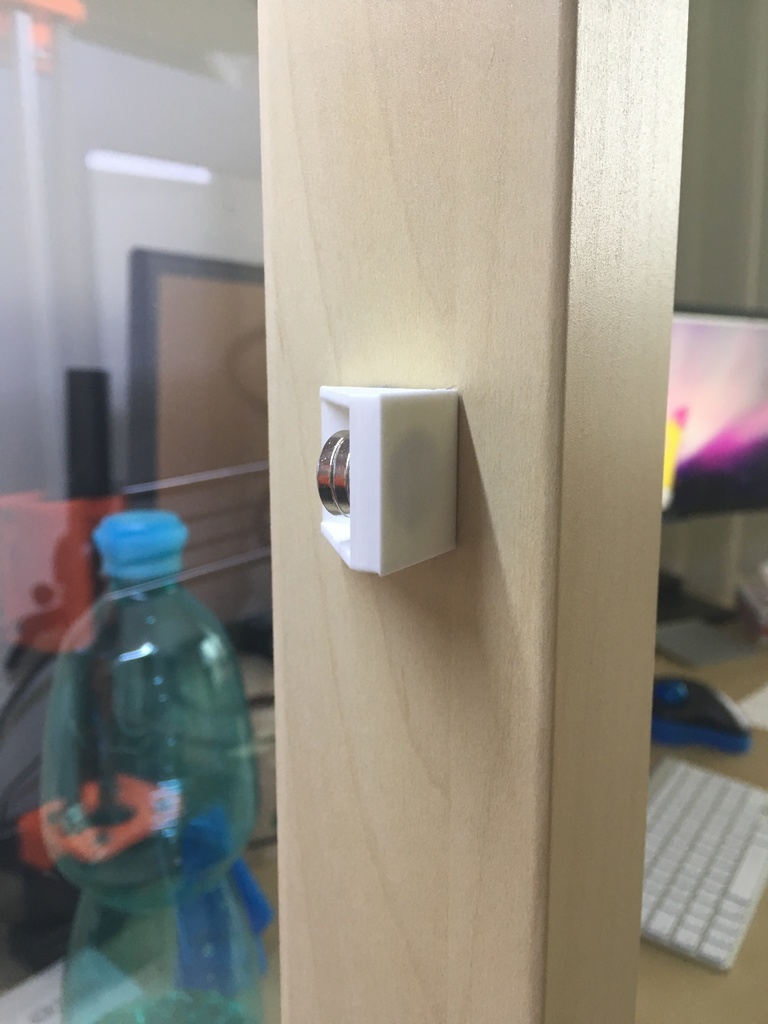 Magnetic door holder