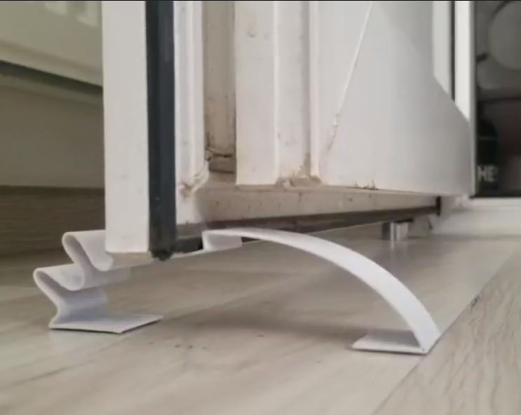 Compliant door stopper - photo 2