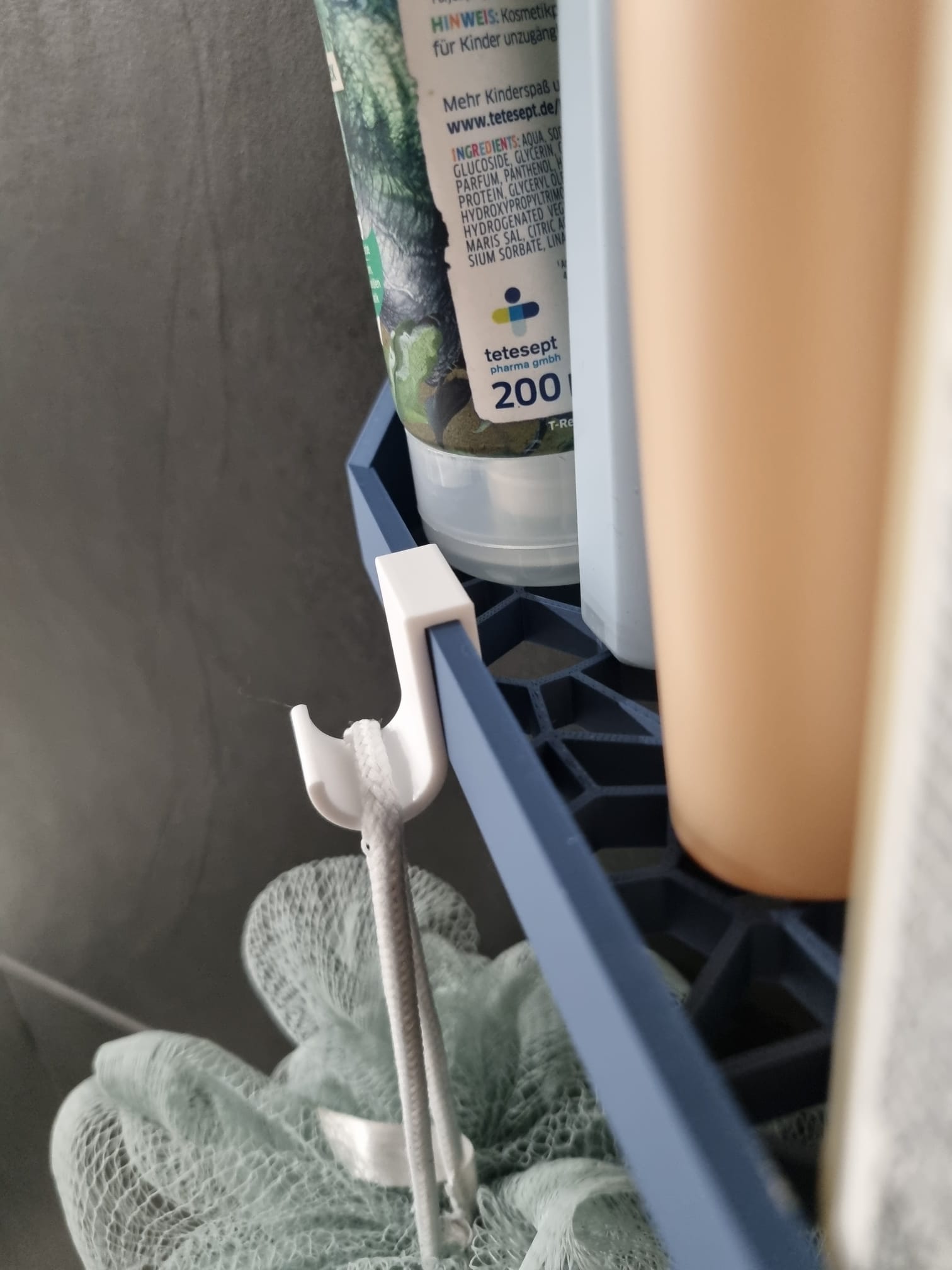 Simple hook for corner shower shelf - photo 2