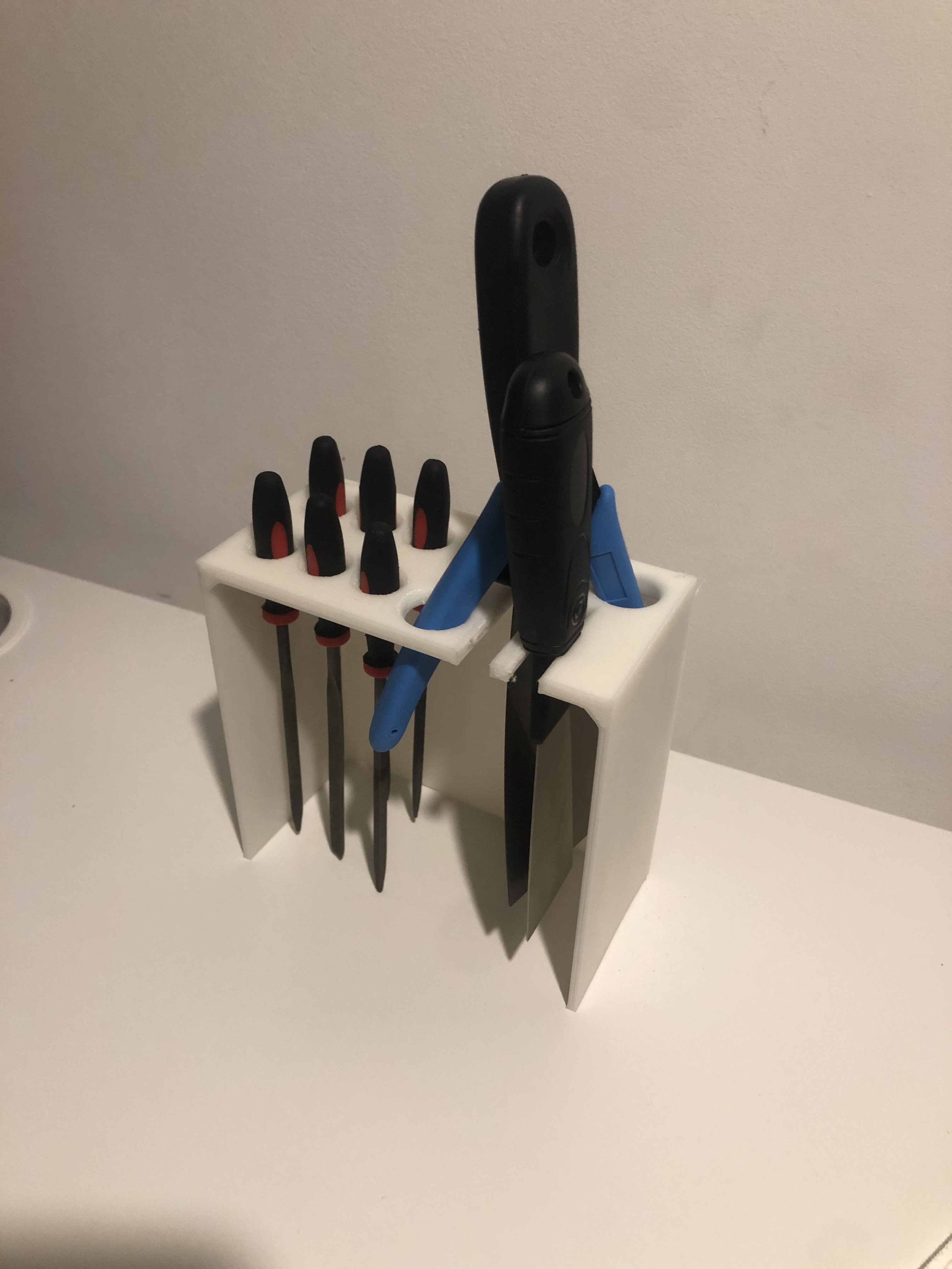 Tool holder / ender