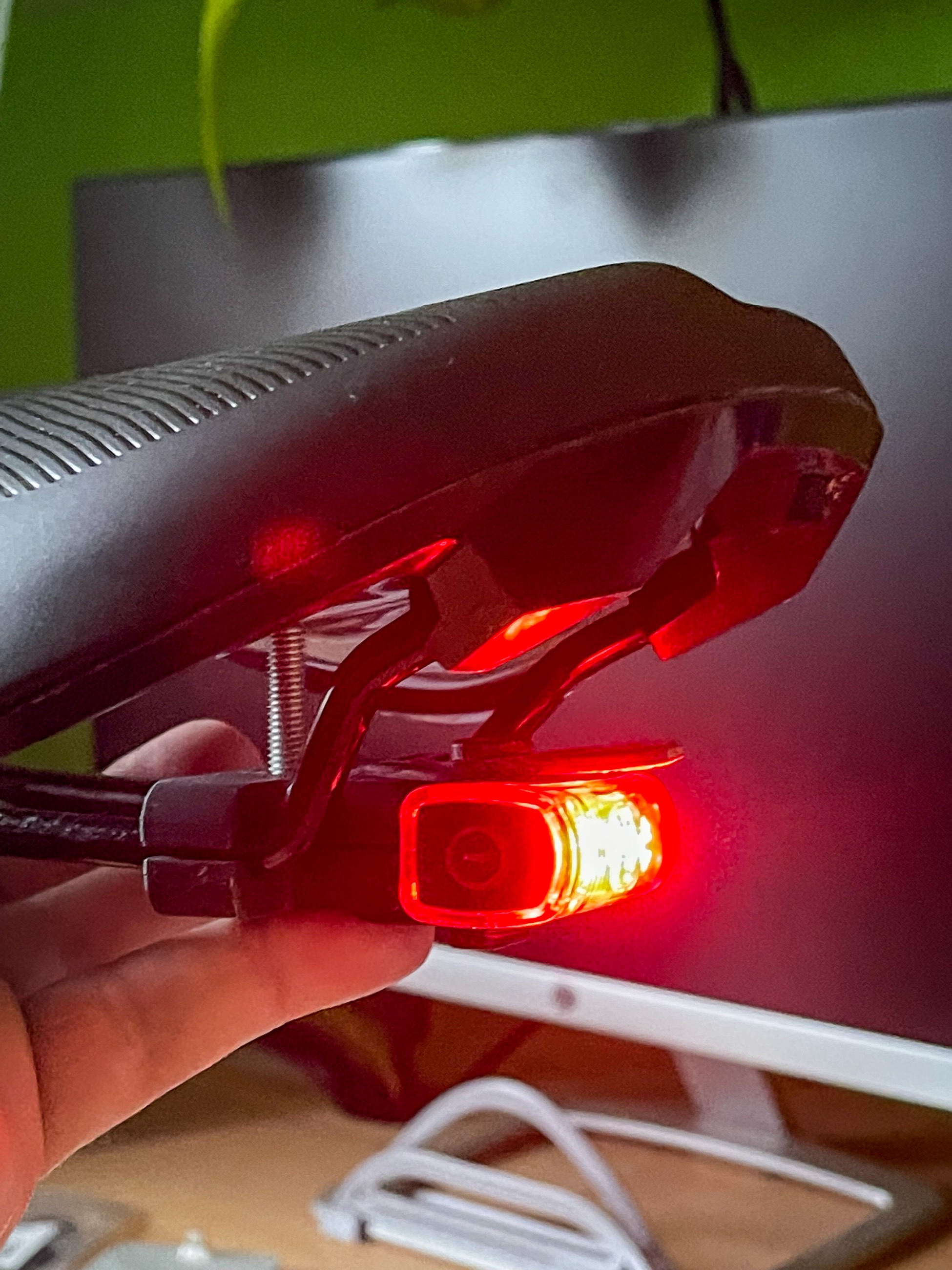 Mount for bicycle backlight under saddle