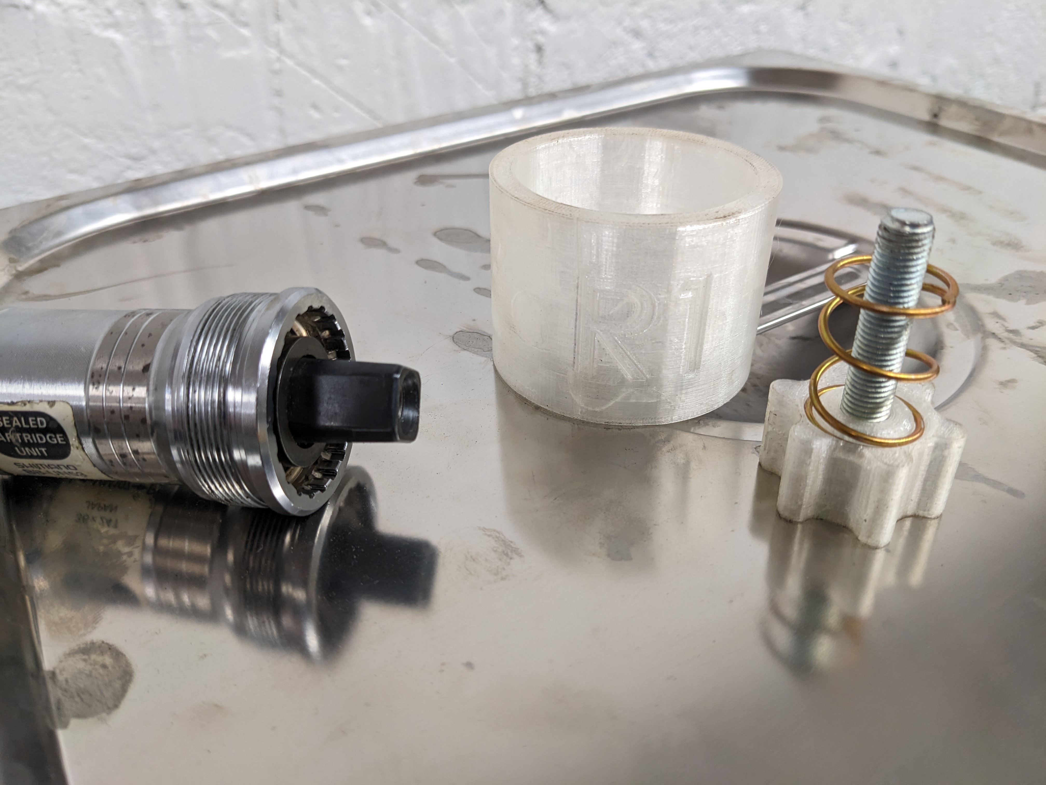 Bottom bracket tool retaining system