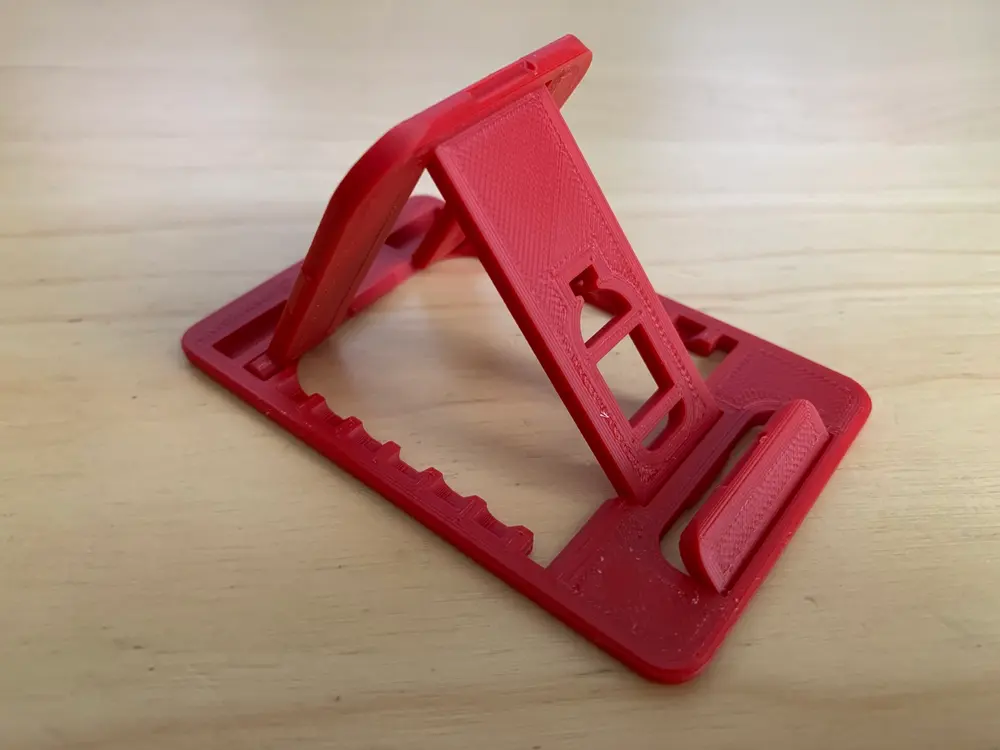 Credit card sized foldable mobile stand