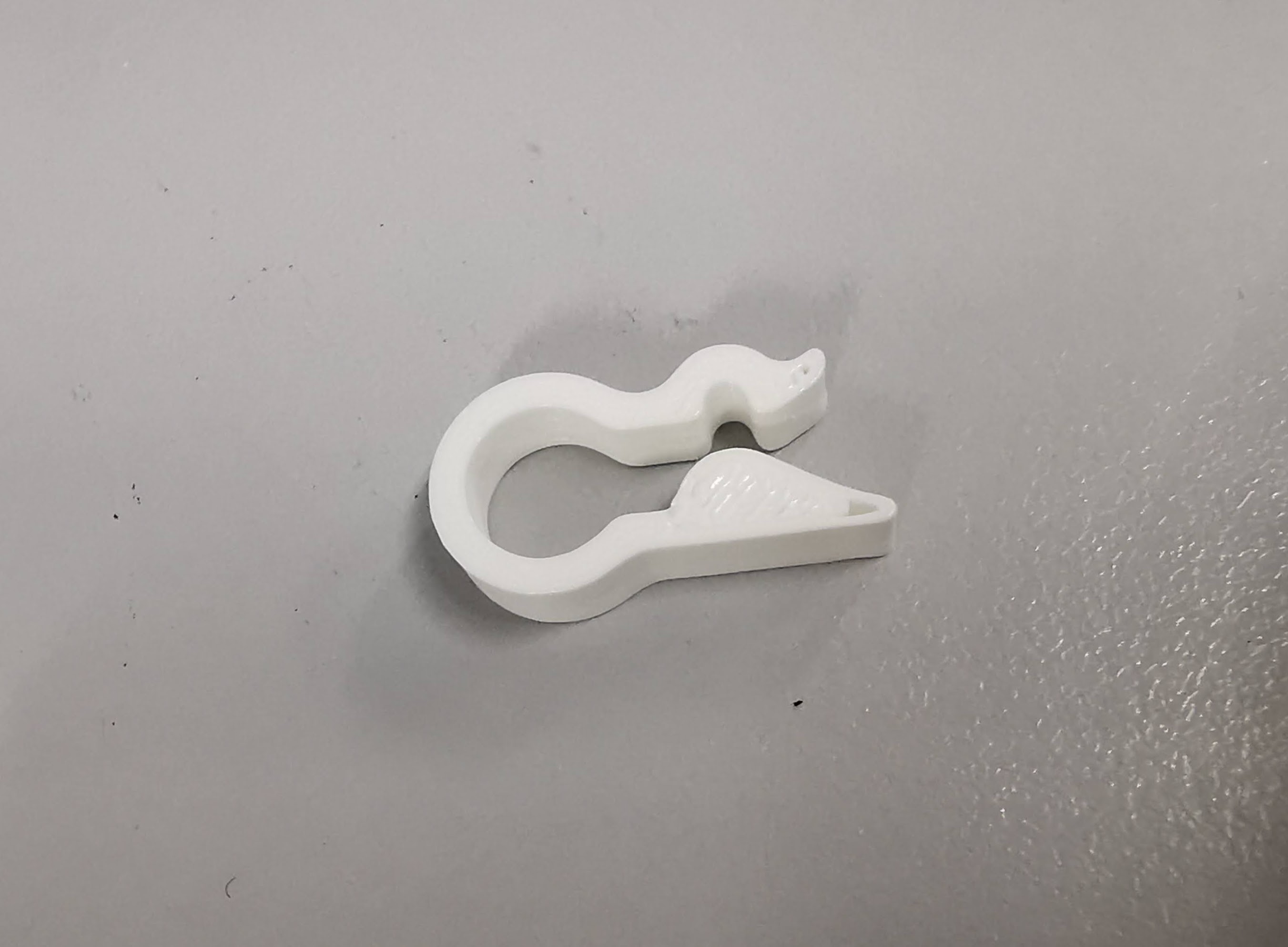 Filament clip tight version