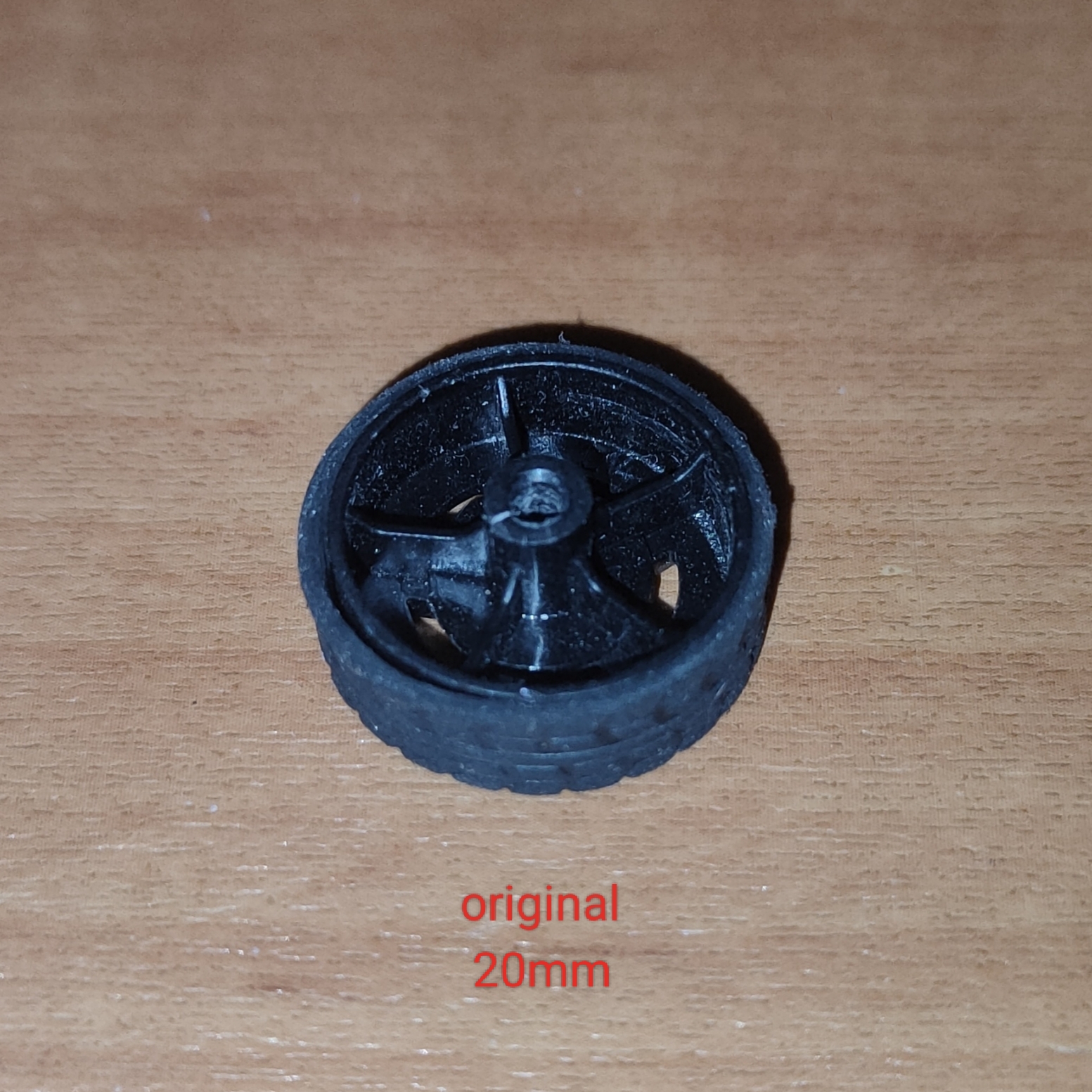 A wheel from a toy car - photo 3