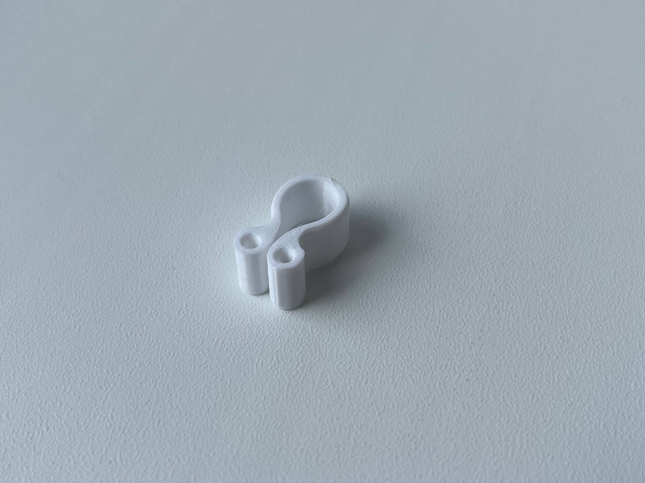 Two-side universal filament clip - photo 2